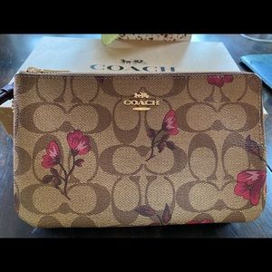 Brand new Coach wristlet